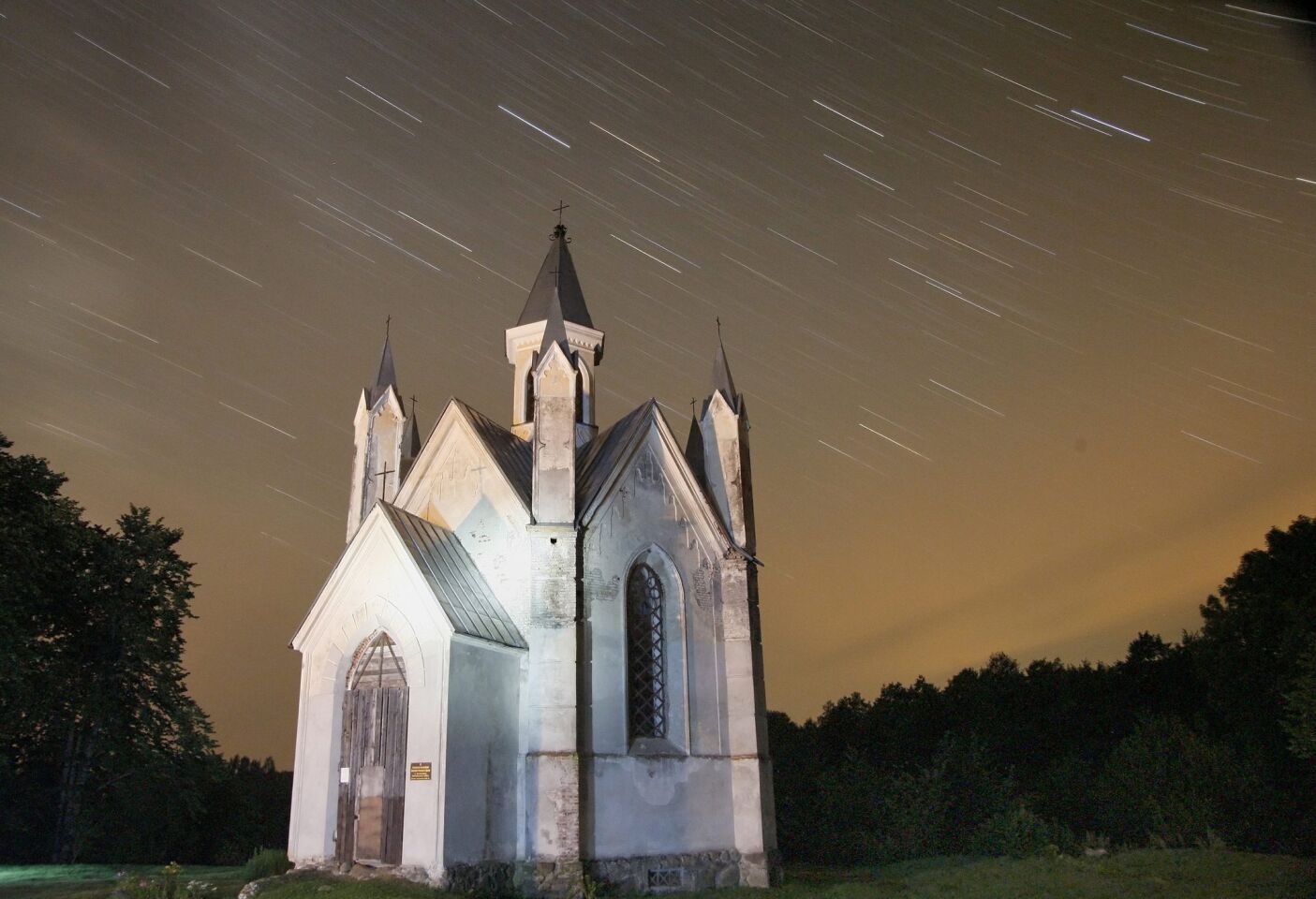A Catholic church is seen on a time-exposure during the Perseid meteor shower near the village of Bogushevichi in Belarus.