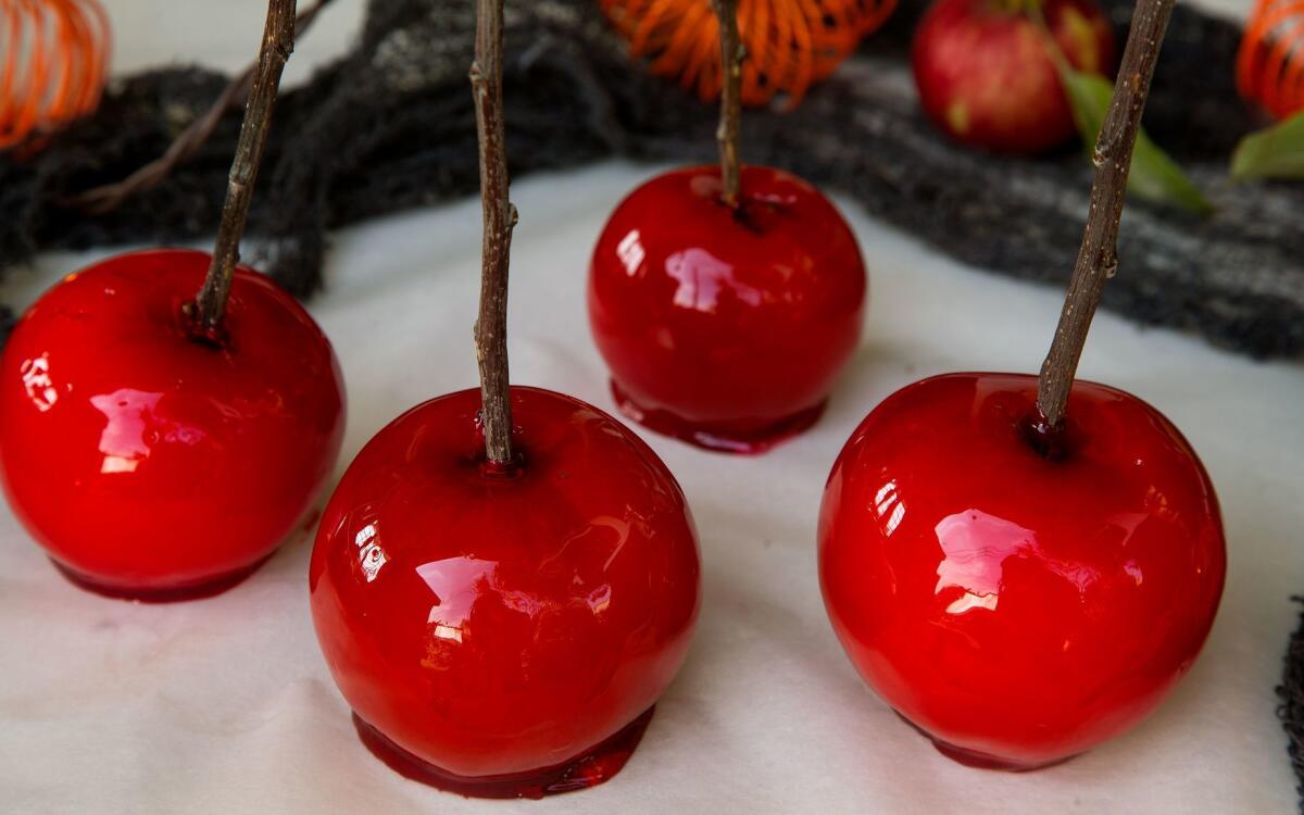 Candy apples with twigs as sticks