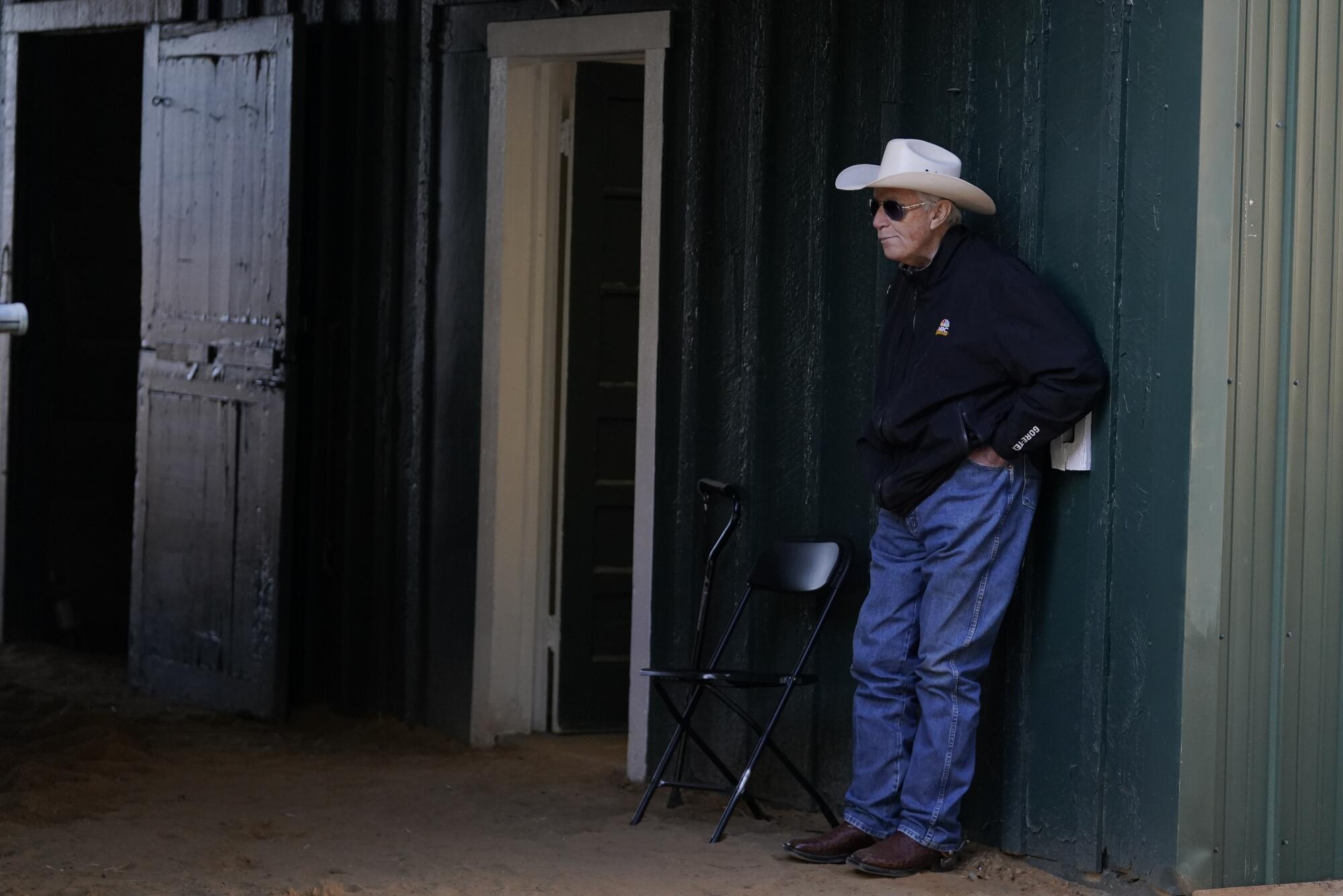 Wayne Lukas stands next to his favorite folding chair at the Stakes Barn at Pimlico Race Course.