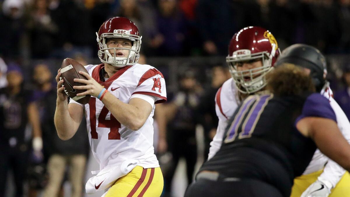 USC quarterback Sam Darnold drops back before throwing a touchdown pass against Washington on Nov. 12.