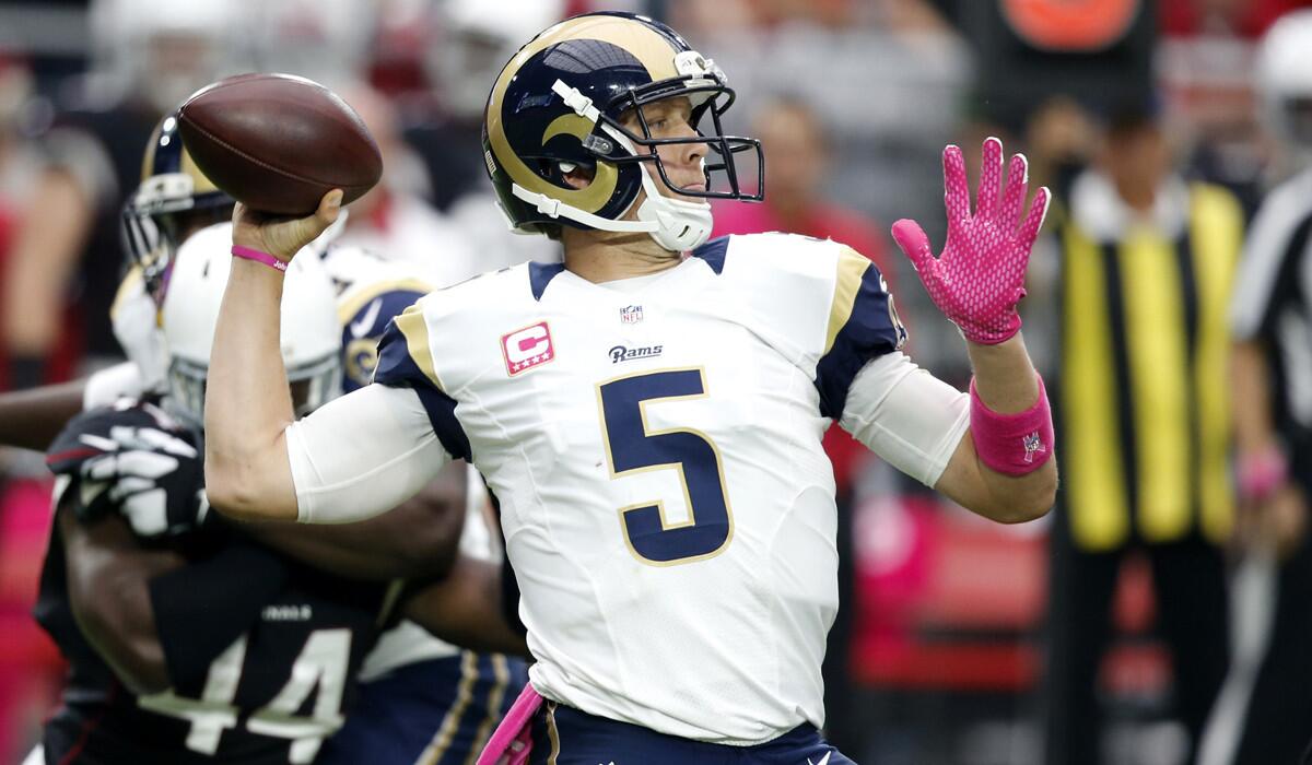 St. Louis Rams quarterback Nick Foles throws against the Arizona Cardinals during the first half of a game on Oct. 4.