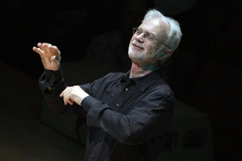 John Adams conducts the Los Angeles Philharmonic in a performance this month. The National Endowment for the Arts is helping to fund the much-belated Southern California premiere in March of his controversial 1991 opera, "The Death of Klinghoffer."