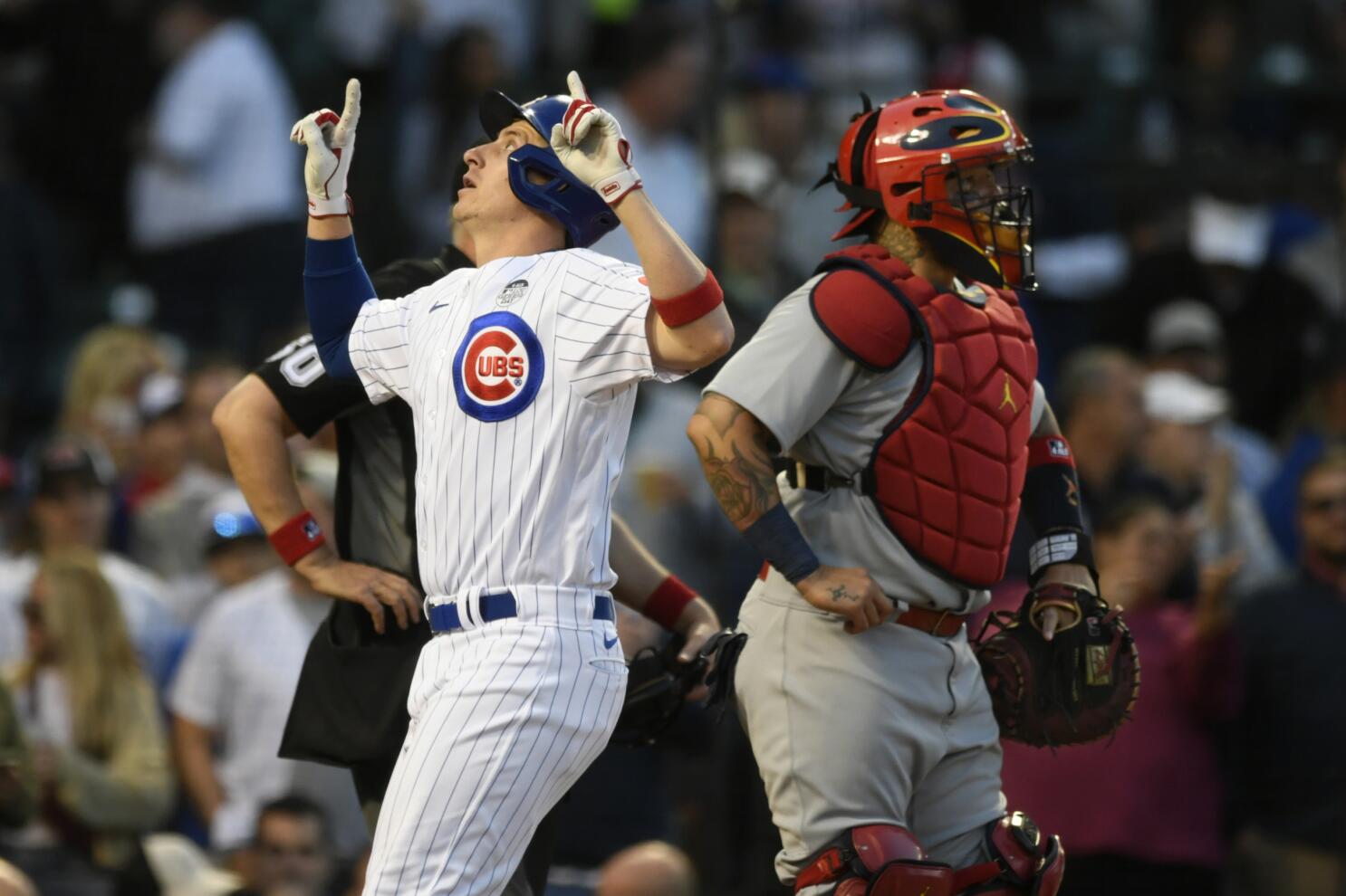 Cubs' Happ hits Cardinals catcher Contreras in head with follow-through,  then gets hit by pitch