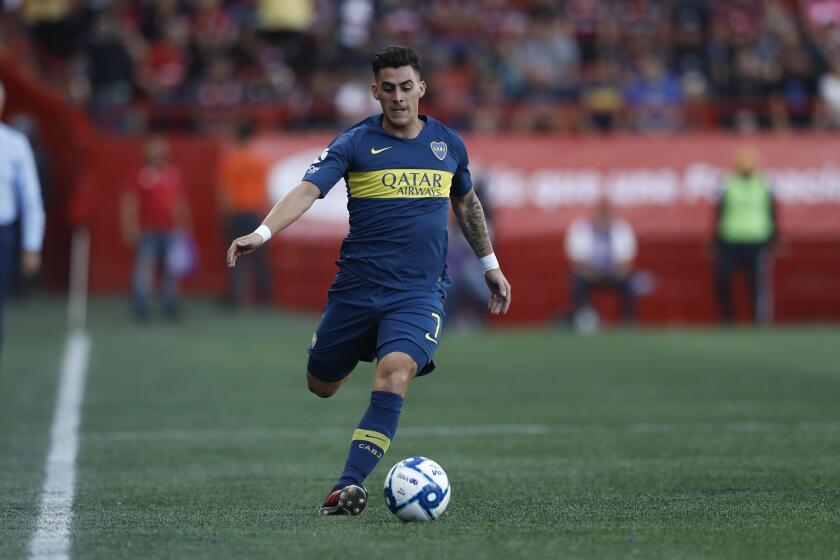 Boca Juniors's Cristian Pavon during the first half of a friendly soccer match against Tijuana Wednesday, July 10, 2019, in Tijuana, Mexico. (AP Photo/Gregory Bull)