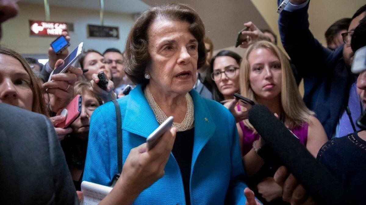 Sen. Dianne Feinstein talks to members of the media on Capitol Hill on Sept. 18, 2018.