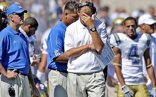 UCLA Coach Rick Neuheisel reacts after the Bruins fumbled for the second time in the second quarter Saturday against Brigham Young.