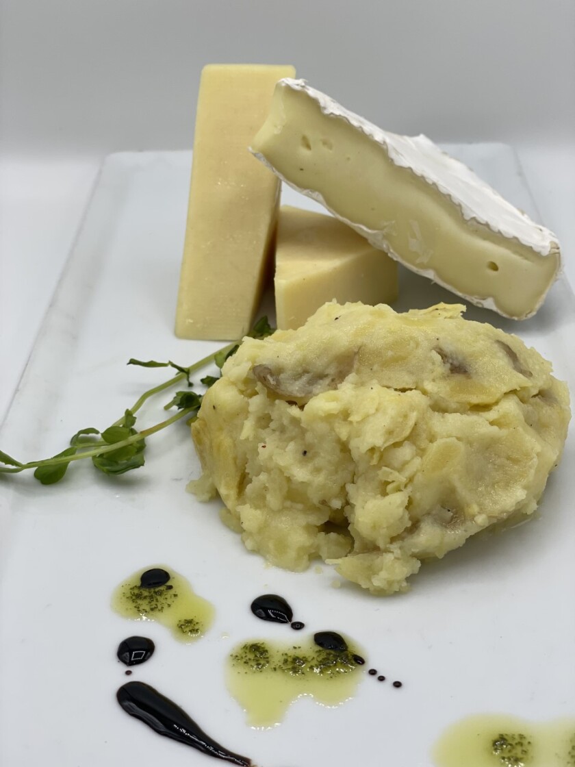 Country Smashed Three Cheese Potatoes from Terra American Bistro in East College Area