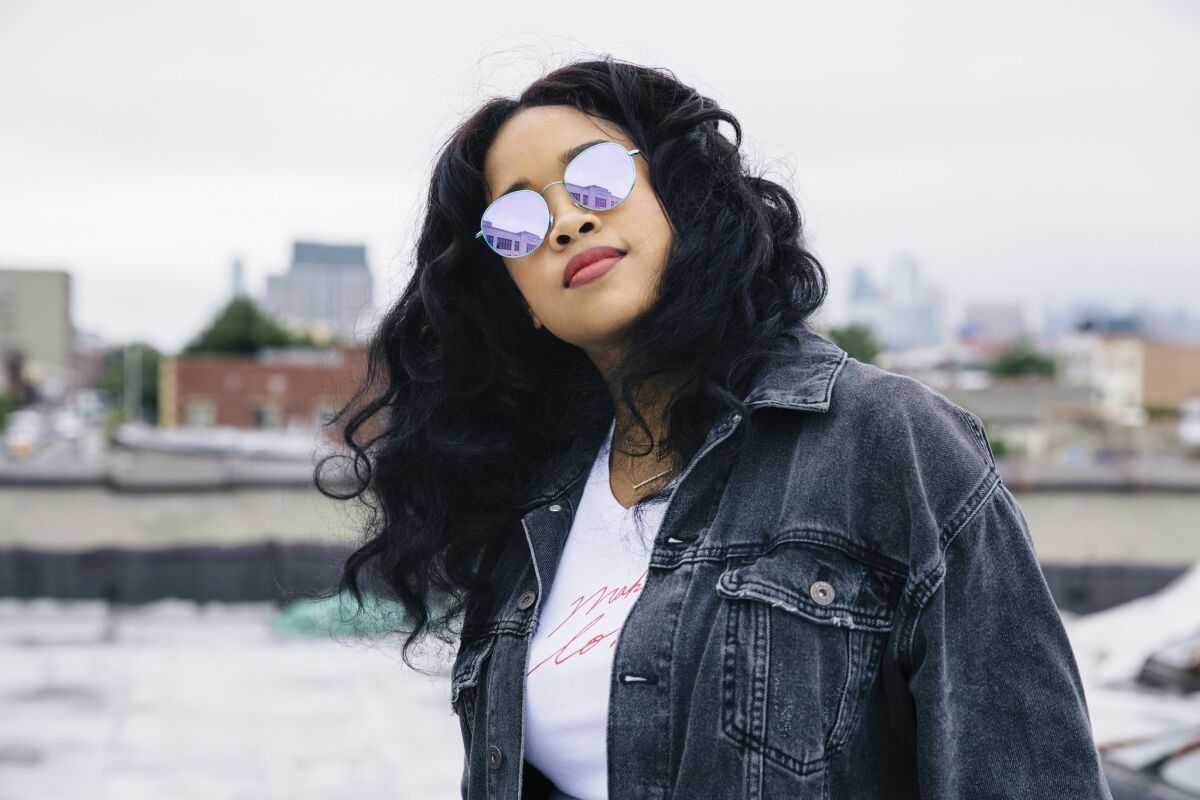H.E.R. (real name: Gabi Wilson) scored five Grammy nominations, including the biggest prize, album of the year.