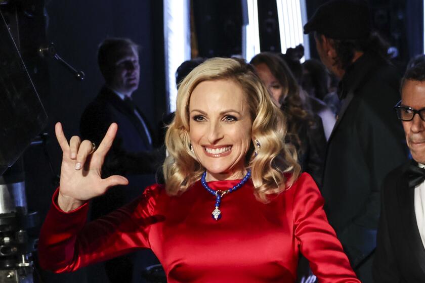 Marlee Matlin smiles backstage during the 94th Academy Awards at the Dolby Theatre in Hollywood.