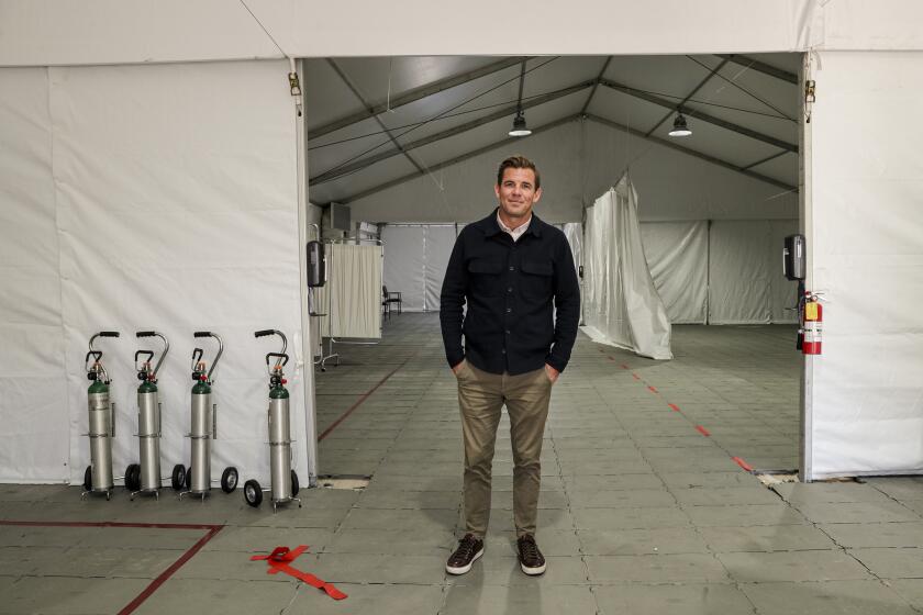 FOUNTAIN VALLEY, CA - MARCH 27, 2020 - Ryan Choura, CEO of Choura Events, installed a tent for emergency use coronavirus screening at Fountain Valley Regional Hospital. As concert industry is decimated by COVID-19, got the business of building tents at medical facilities. (Irfan Khan / Los Angeles Times)