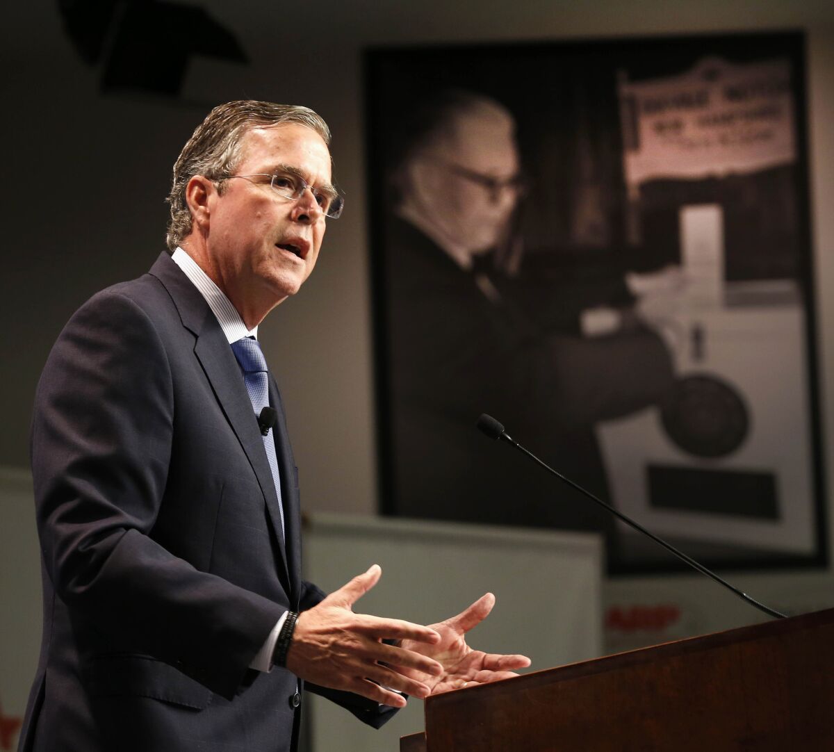 Former Florida Gov. Jeb Bush announces his plan to repeal and replace President Obama's healthcare law, Tuesday at Saint Anselm College in Manchester, N.H.