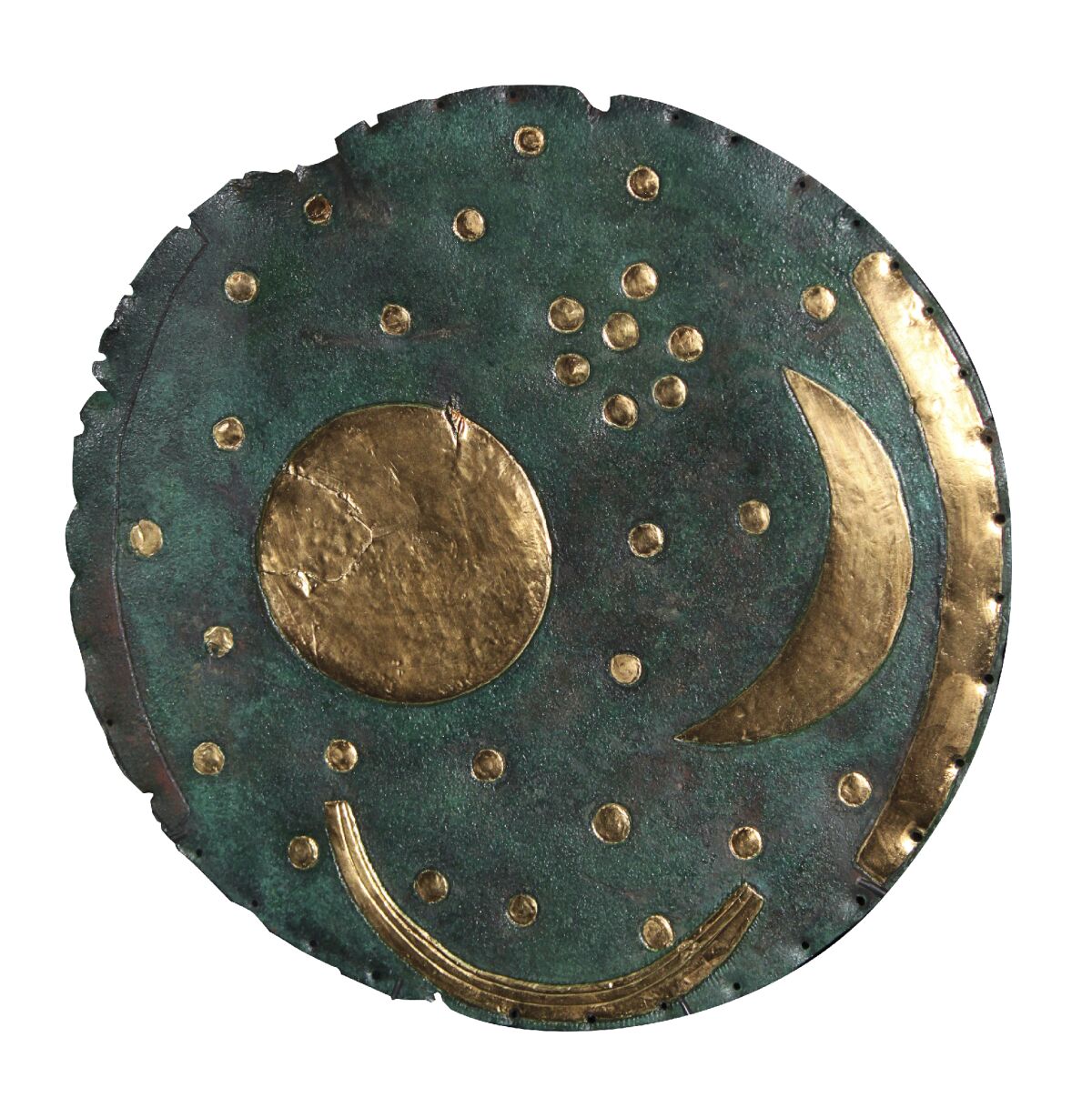 This image courtesy of the State Office for Heritage Management and Archaeology Saxony-Anhalt shows the Nebra Sky Disc. The British Museum will display what it says is the world’s oldest surviving map of the stars in a major upcoming exhibition on the Stonehenge stone circle. The 3,600-year-old “Nebra Sky Disc,” first discovered in Germany in 1999, is one of the oldest surviving representations of the cosmos in the world and has never before been displayed in the U.K., the London museum said Monday. (Juraj Liptak/State Office for Heritage Management and Archaeology Saxony-Anhalt via AP)