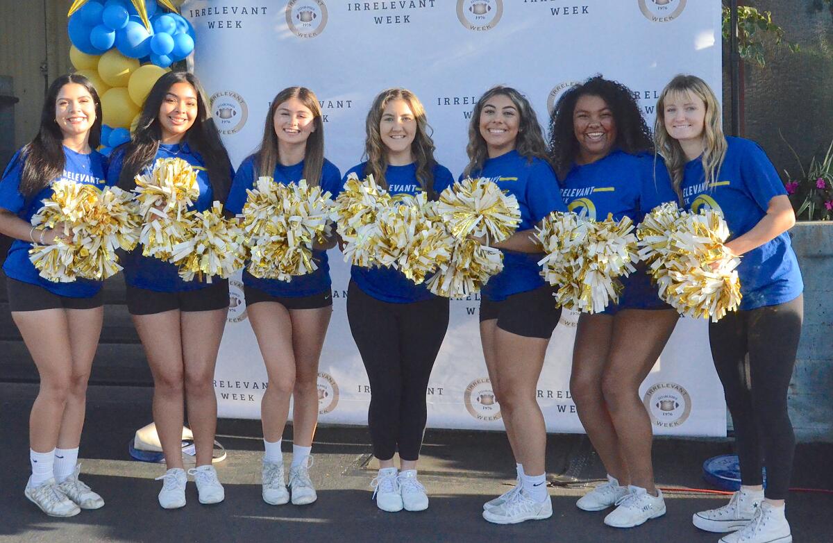 Cheerleaders welcome guests to the Mr. Irrelevant Lowsman Banquet at the Cannery Restaurant in Newport Beach on Monday.