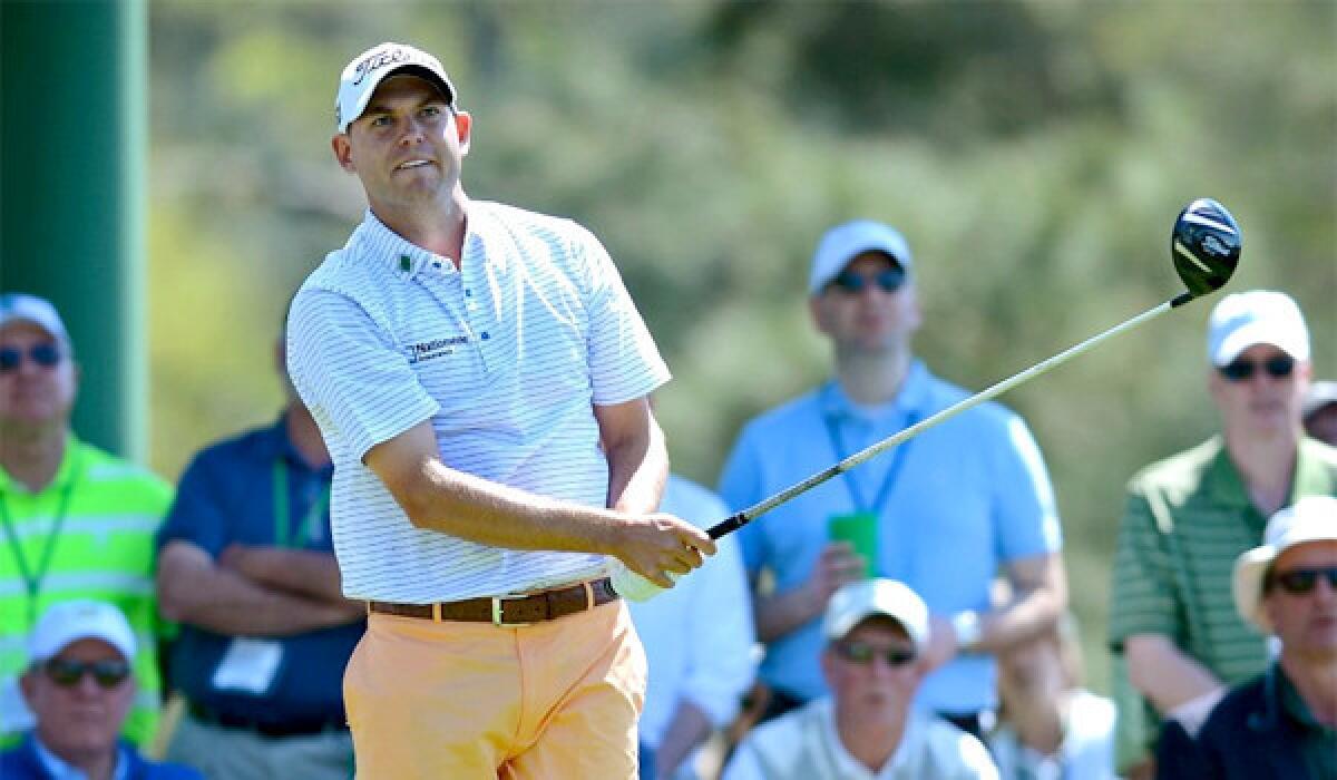 Bill Haas watches the flight of his drive from the 18th tee during the first round of the Masters on Thursday at Augusta National.