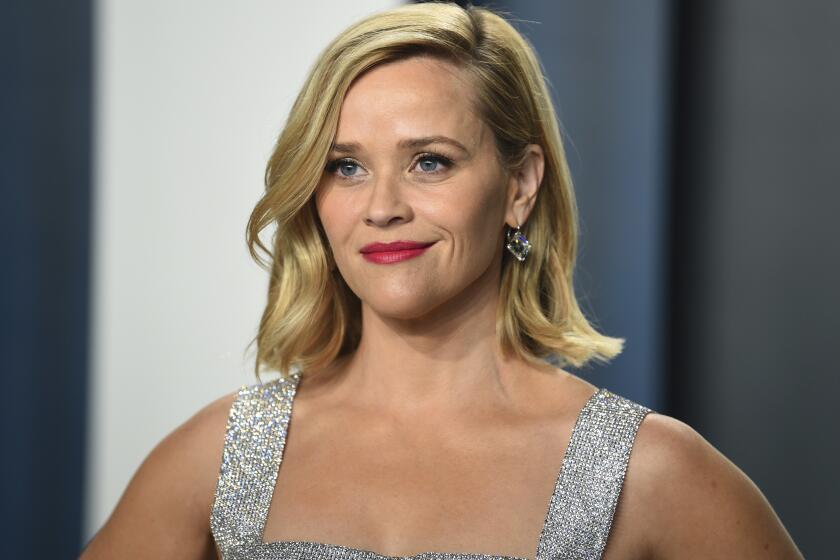 Reese Witherspoon in a silver dress