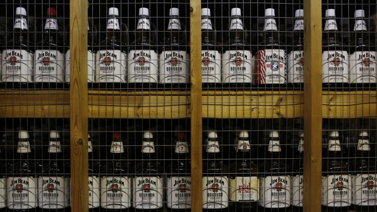 Bottles of Jim Beam Bourbon sit in storage at the Jim Beam Bourbon Distillery in 2014 in Clermont, Ky.