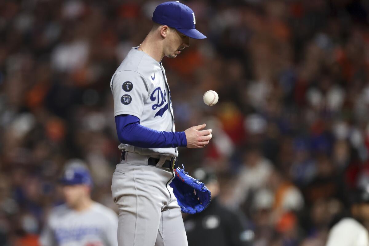 Dodgers starting pitcher Walker Buehler stands on the mound during the second inning Friday.