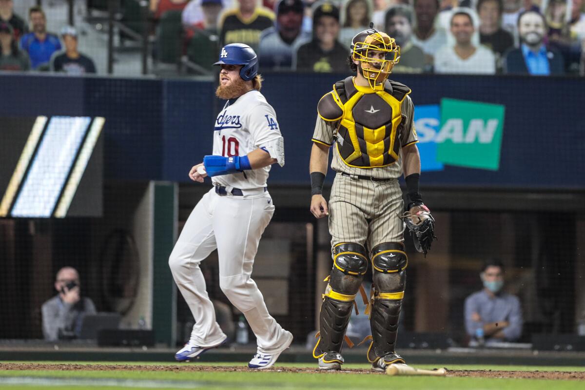 Dodgers third baseman Justin Turner scores in the fifth inning against the San Diego Padres on Tuesday.