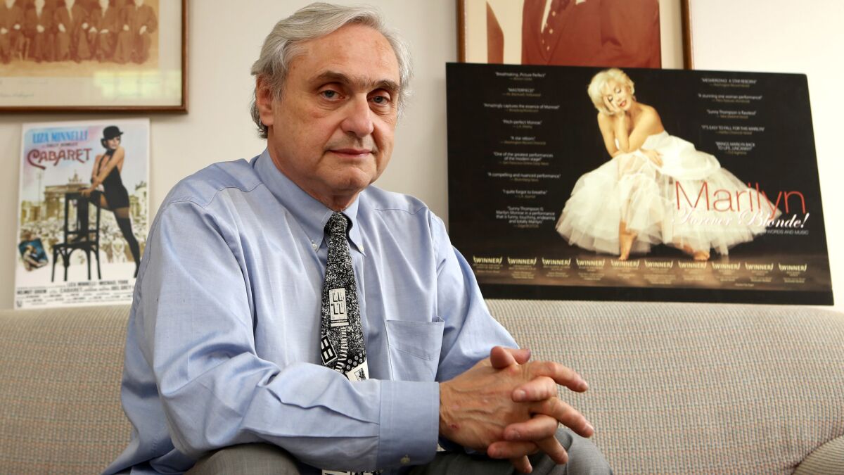 Judge Alex Kozinski, pictured in 2015 in his chambers, said he'll retire amid more than a dozen reports of sexual misconduct or inappropriate comments.