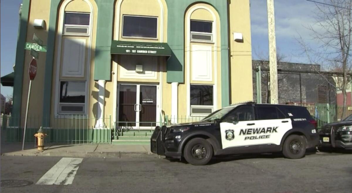 A Newark police vehicle is parked outside the Masjid-Muhammad-Newark Mosque in Newark, N.J. 