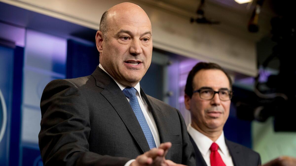 White House economic advisor Gary Cohn, left, and Treasury Secretary Steven T. Mnuchin appear at the White House in April.