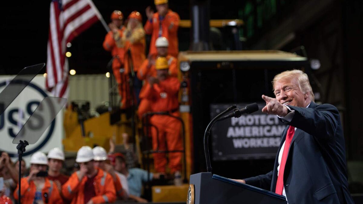 President Trump speaks about trade at U.S. Steel's Granite City Works in Granite City, Ill., in July. U.S. Steel has ramped up production, and the company announced this summer that, thanks in part to the tariffs, its profit will surge.