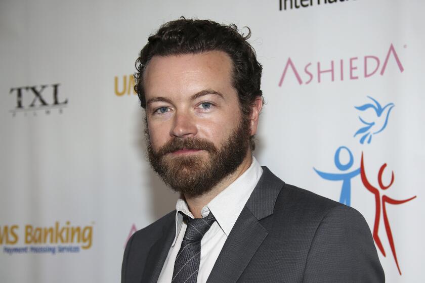 FILE - In this March 24, 2014 file photo, actor Danny Masterson arrives at Youth for Human Rights International Celebrity Benefit in Los Angeles. Masterson, known for his roles in "That '70s Show" and "The Ranch," has been charged with raping three women, Los Angeles County District Attorney's officials announced Wednesday. The incidents occurred between 2001 and 2003, officials allege. Masterson's attorney Tom Mesereau said his client “is innocent, we’re confident that he will be exonerated when all the evidence finally comes to light and witnesses have the opportunity to testify.” (Annie I. Bang/Invision/AP, File)