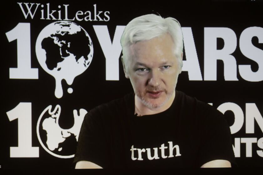 WikiLeaks founder Julian Assange participates via video link at a news conference Oct. 4 in Berlin marking the 10th anniversary of the secrecy-spilling group.