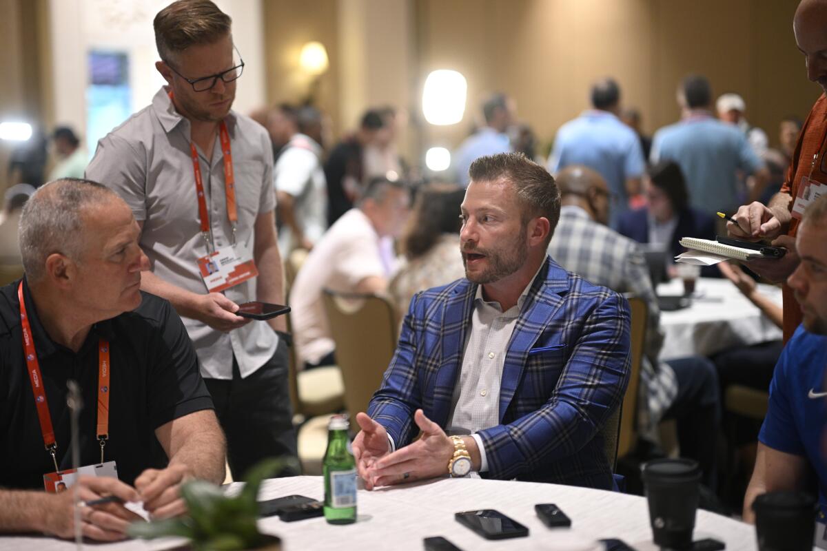 Rams coach Sean McVay talks with reporters during availability at the NFL owners meetings.