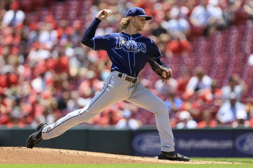 Tampa Bay Rays' Shane Baz throws during the first inning of a baseball game against the Cincinnati Reds in Cincinnati, Sunday, July 10, 2022. (AP Photo/Aaron Doster)