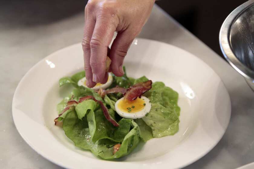 Master chef Nancy Silverton creates a salad named - "Butter Lettuce with Hazlenuts, Bacon, Gorgonzola Dolce, Egg and Sherry Vinaigrette" at Mozza restaurant on Melrose Ave in L.A.