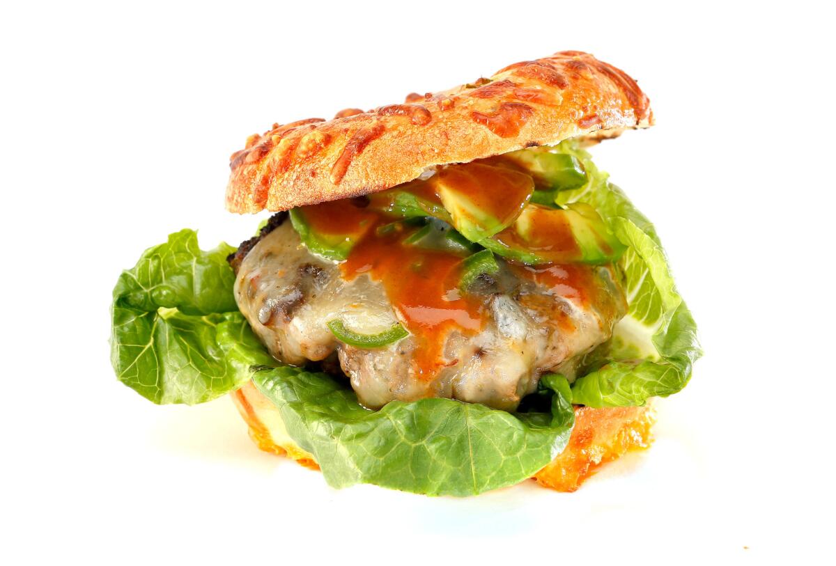 This hot jalapeno burger includes habanero powder, pepper jack cheese, jalapeno slices and a jalapeno cheese bagel.