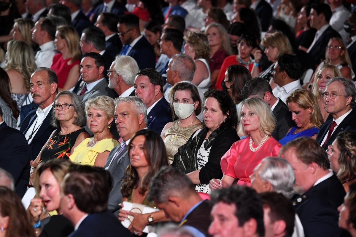 People wait for Trump's acceptance speech on the South Lawn of the White House.