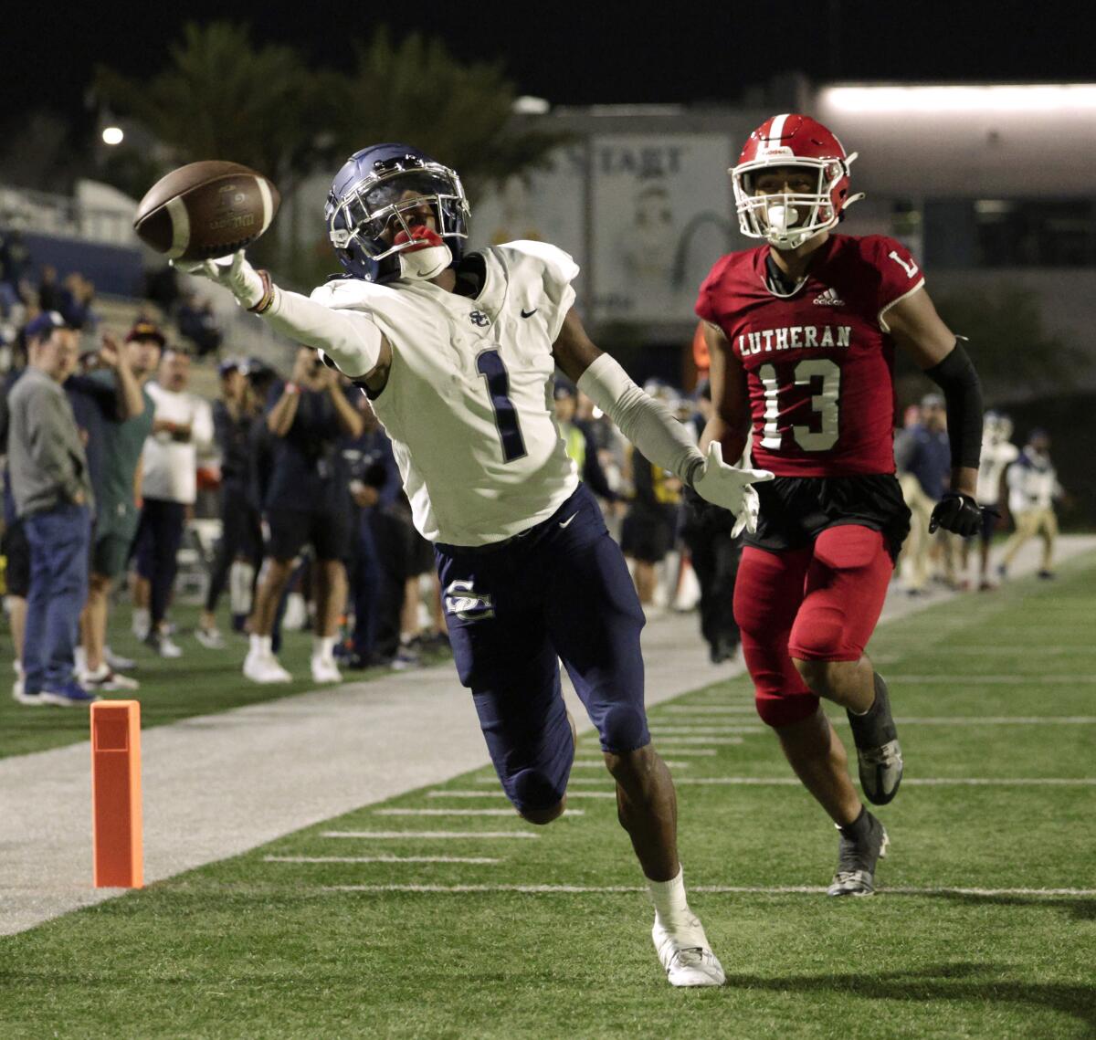 Sierra Canyon wide receiver Jae'on Young can't quite get to a pass in the end zone Friday during a win over Orange Lutheran.