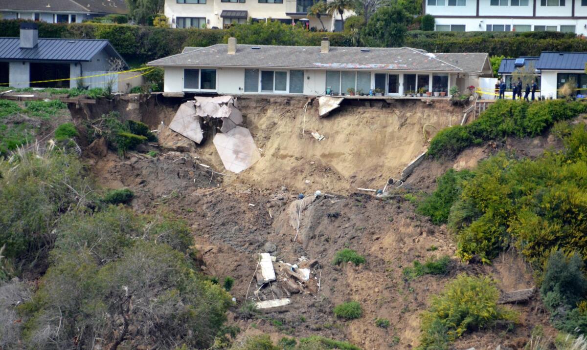 The backyard of a Newport Beach home at 1930 Galaxy Drive has crumbled due to a landslide.