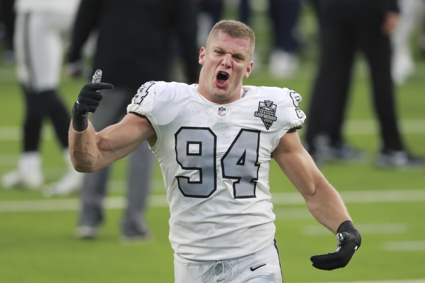 Raiders defensive end Carl Nassib celebrates after a victory over the Chargers last season.