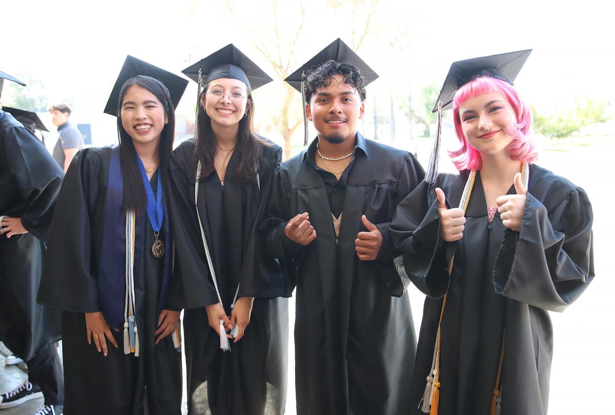 Early College High School graduates Dalena Tang, Jamila Toumi, Yandel Urbano, and Gracelyn Valencia.