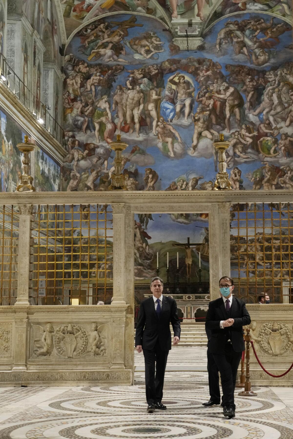 Secretary of State Antony J. Blinken, left, visits the Sistine Chapel ahead of his meeting with the pope 