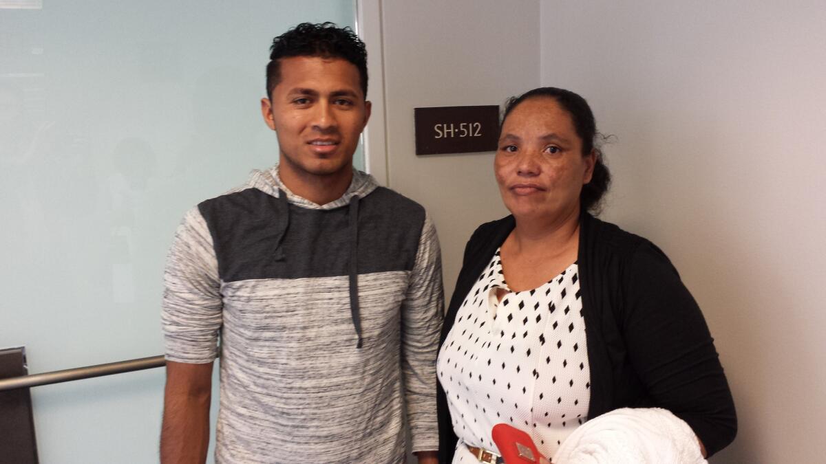 Elman Soriano, left, and Dilsia Acosta visited Capitol Hill on Thursday to plead for release of their relatives who were swept up in immigration raids this year.