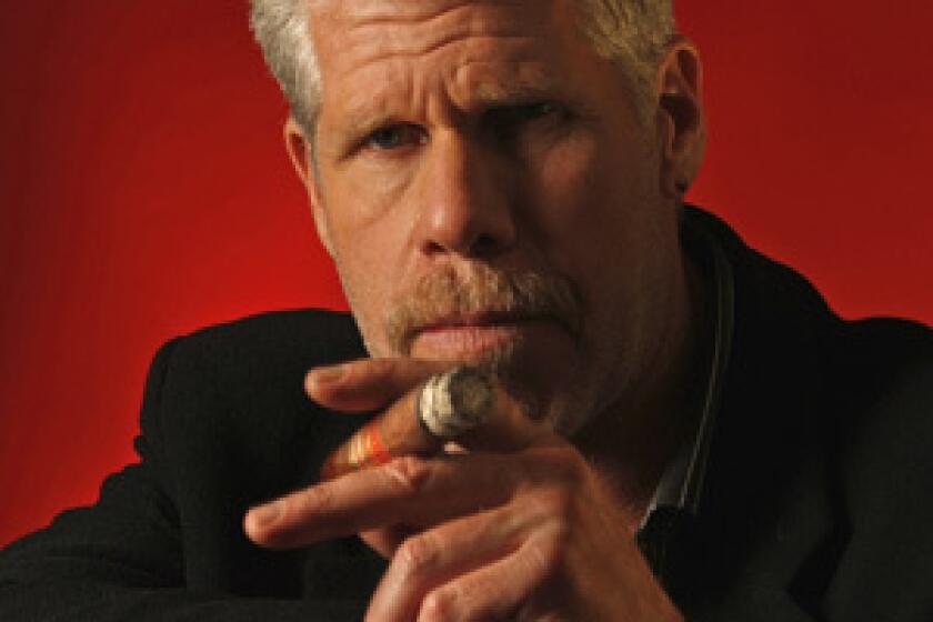 SMOKING: Ron Perlman plays the title demon in Hellboy II, which opened at No. 1.