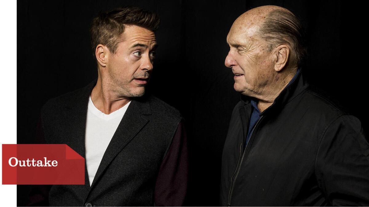 Actors Robert Downey Jr., left, and Robert Duvall talk about their movie "The Judge" at an Envelope Screening Series showing at the ArcLight Cinemas in Sherman Oaks.