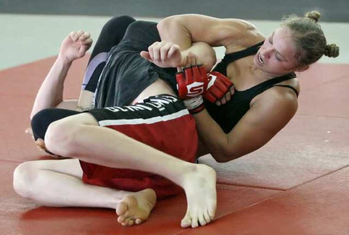 ARCHIVE PHOTO: Ronda Rousey will go down in the history books as the first female fighter to sign with the UFC.