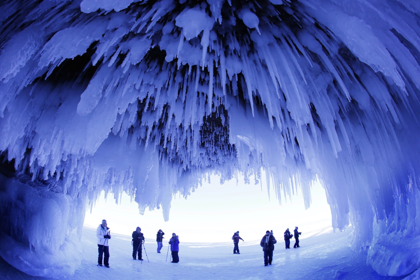 Mother Nature has become a Chihuly-like sculptress in sea caves along Lake Superior in northern Wisconsin. Icicles hang by the thousands in caves at Apostle Islands National Lakeshore. In warmer weather, the caves would be accessible only by water, but during this consistently cold winter, they are accessible by frozen lakeshore.
