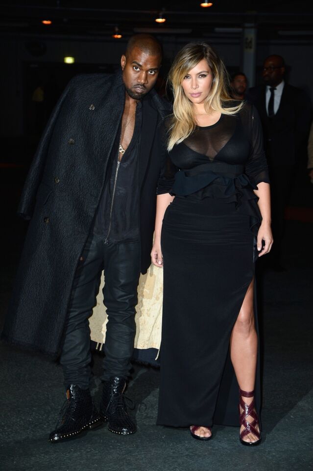 Kim Kardashian, in her custom-designed Givenchy by Ricardo Tisci gown, and Kanye West at the Givenchy show.