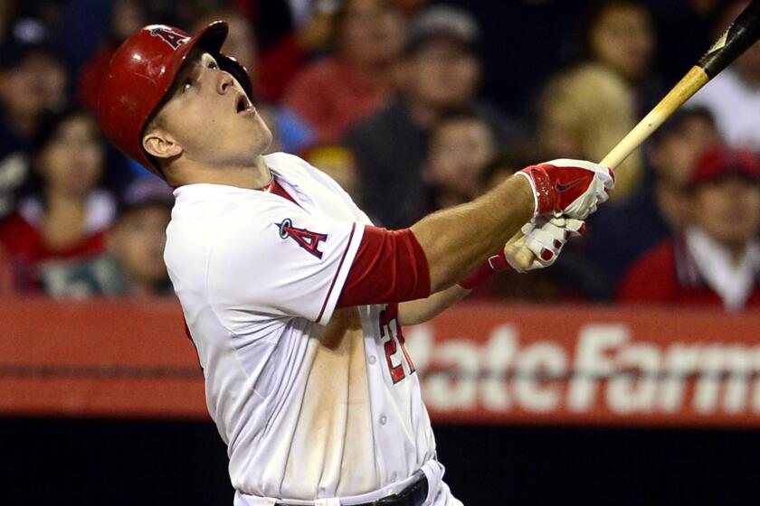 Angels outfielder Mike Trout fouls out against the New York Yankees on May 5. Angels Manager Mike Scioscia says he believes Trout will snap out of his slump at the plate.