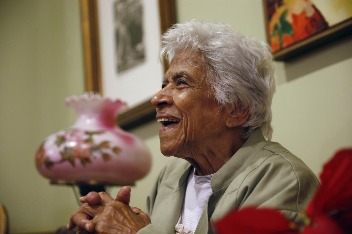 FILE - In this Wednesday, Dec. 30, 2015 file photo, Leah Chase speaks during an interview at her family's restaurant, Dooky Chase's, in New Orleans. The restaurant, which served as a safe meeting space for civil rights activists to strategize, is the site of the first marker to go up on the Louisiana Civil Rights Trail on Monday, May 3, 2021. Chase died in 2019 but her family still owns and operates the restaurant, whose walls are graced by an extensive collection of works by African American artists. (AP Photo/Gerald Herbert)