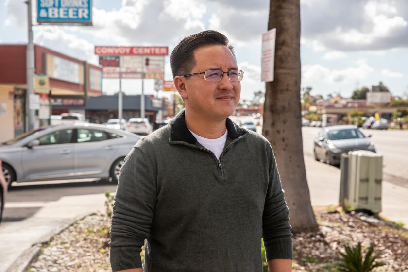 San Diego, CA - December 07: Kent Lee poses for a portrait in the Convoy area near Cross Street Chicken in San Diego, CA on Wednesday, Dec. 7, 2022. Lee, who is ahead in the District 6 race, is expected to be sworn in to the San Diego City Council on Dec. 12. (Adriana Heldiz / The San Diego Union-Tribune)