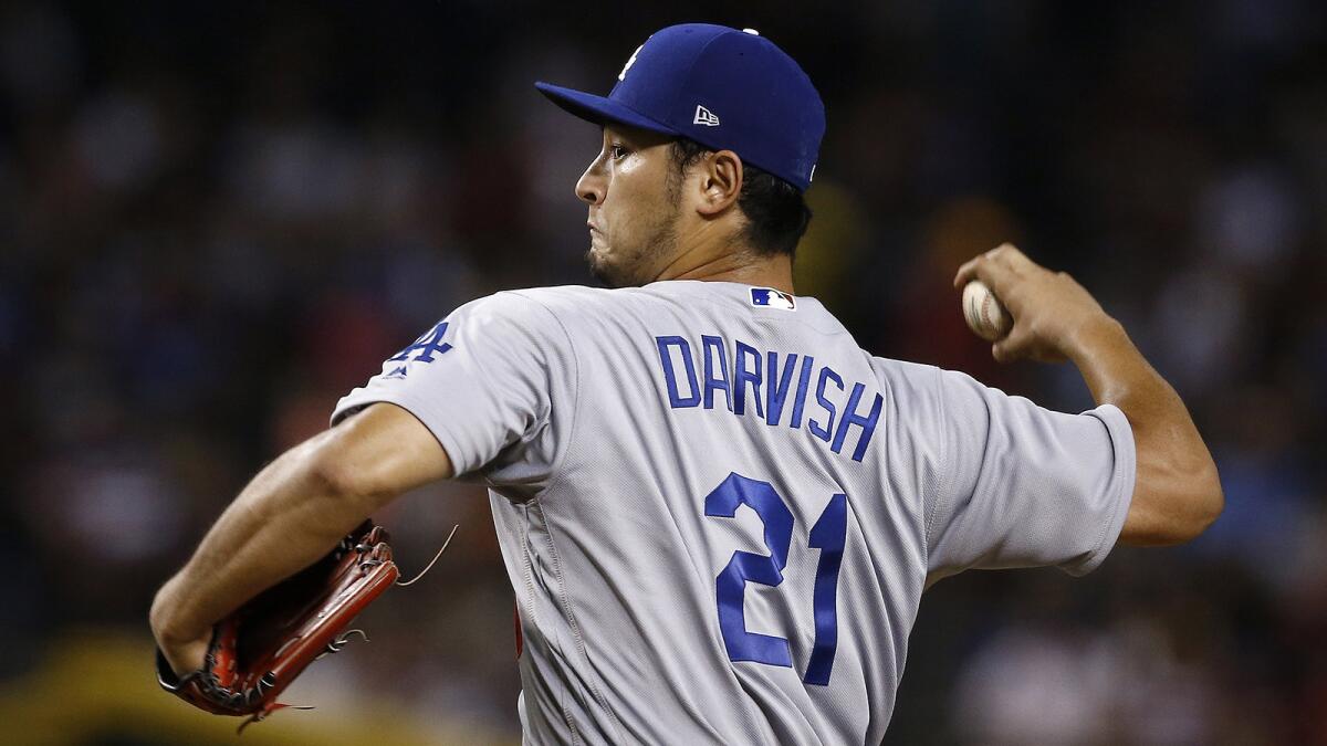 Dodgers starter Yu Darvish pitches against the Arizona Diamondbacks on Aug. 10 in Phoenix.
