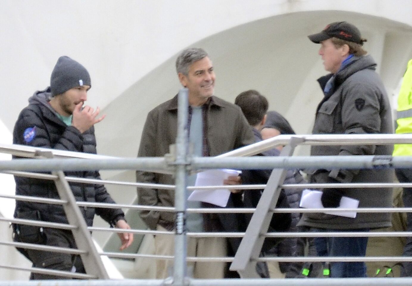 George Clooney, second from left, filming "Tomorrowland" at Ciudad de las Artes y las Ciencias on Jan. 21, 2014, in Valencia, Spain.