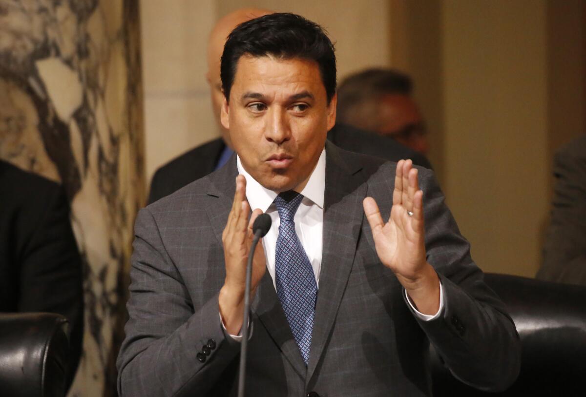 Los Angeles City Councilman Jose Huizar was removed from his committee assignments on Thursday, days after FBI agents raided his home and offices.